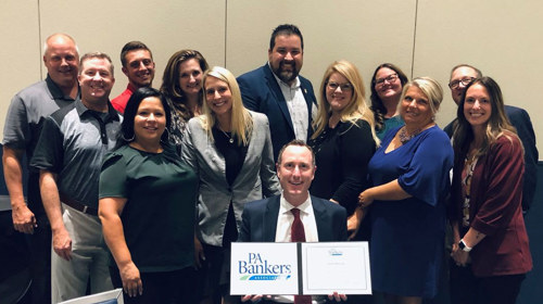 Group of Adults Smiling at Camera